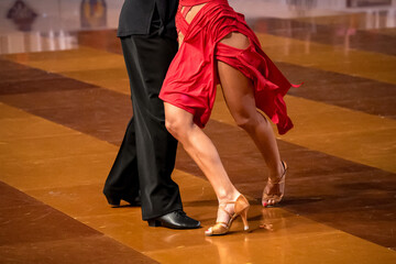 a couple dance a Latin dance. the legs of a dancing couple
