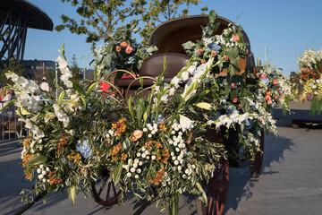 A carriage decorated with flowers. The annual International Flower Festival in St. Petersburg