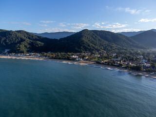 Obraz premium Sunrise in a fishing village on a beautiful beach