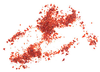 Crushed red chili pepper flakes isolated on a white background, top view. Spicy chili red pepper chips.
