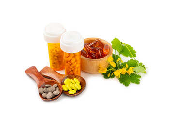 Alternative medicine herbal capsule organic drug isolated on white background.Assortment of herbal and tablets,vitamins and dietary supplements.medicinal and Healing herbs.natural supplements 