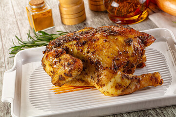 Baked in oven whole chicken with spices