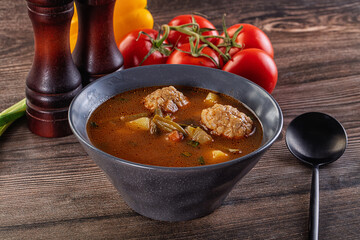 Tomato Soup with meatballs and vegetables