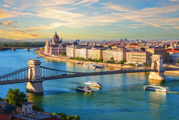 Famous Szechenyi Chain Bridge, symbol of Budapest, Hungary, summer sunset view