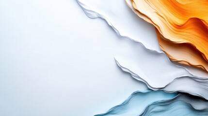 Softly rippling layers of colorful paper in white, blue, and orange form an artistic composition that showcases texture and fluidity against a simple background.