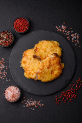 Steak, a pork or chicken chop covered with melted cheese. Grilled meat