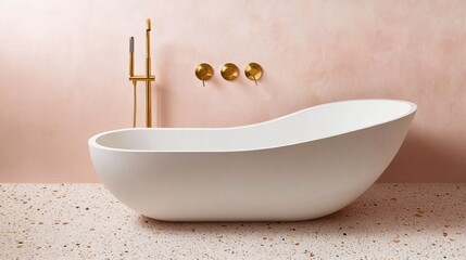 Minimal bathtub design placed against a pastel pink wall with terrazzo flooring and brass fixtures