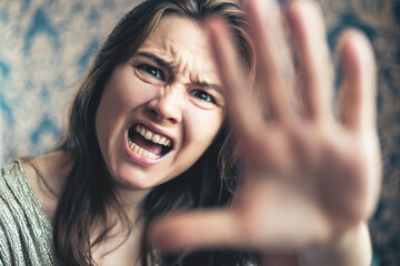 Portrait of an angry woman showing refusal