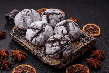 Chocolate crinkle cookies sprinkled with powdered sugar, homemade baking