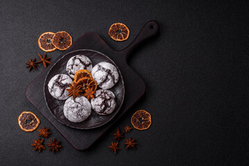 Chocolate crinkle cookies sprinkled with powdered sugar, homemade baking