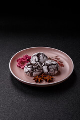 Chocolate crinkle cookies sprinkled with powdered sugar, homemade baking