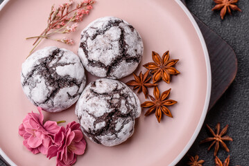 Chocolate crinkle cookies sprinkled with powdered sugar, homemade baking