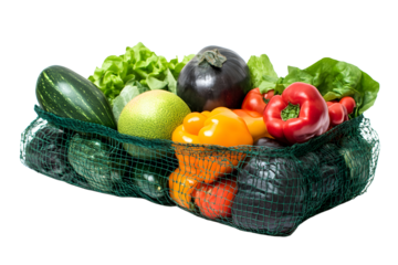 Reusable grocery bag containing fresh fruits and vegetables isolated on white background.