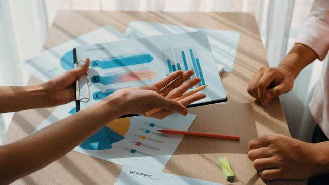 Startup employee working together, analyzing BI dashboard paper on financial data report but reject strategic marketing planning due to not aligned with company direction in panorama video. Synergic