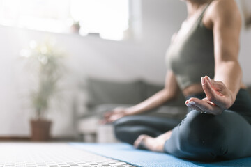 Practicing mindfulness and meditation in a calm indoor space during morning hours
