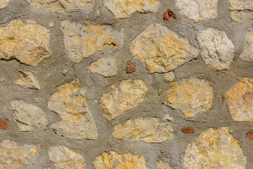 Texture of the limestone wall for background. Natural pattern