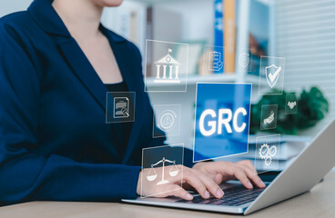GRC Governance Risk Compliance Concept. Businesswoman with GRC governance, risk, compliance icons,...