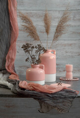 Beautiful still life in gray-pink and white tones for the interior.
