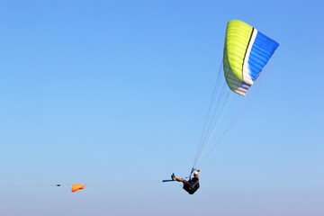 Paraglider being towed by a winch	