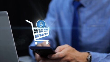 Businessman using smartphone with animated shopping cart. Modern e-commerce and mobile online purchase concept