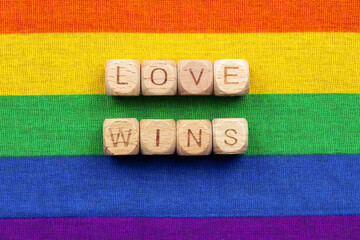 Love wins message on rainbow lgbtq pride flag for equality and acceptance