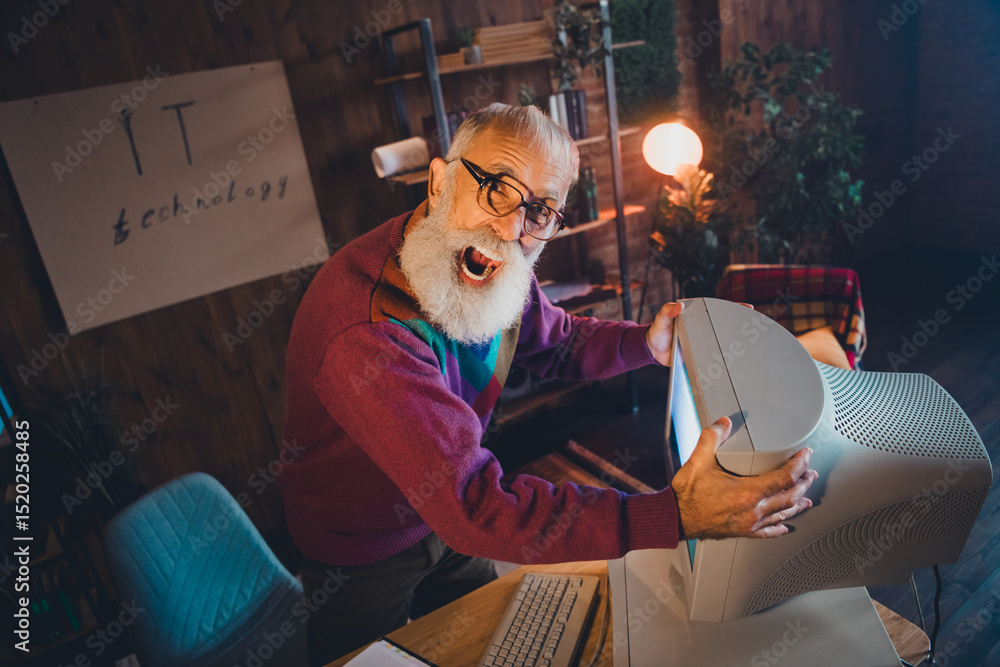 Poster elderly programmer working with vintage computer technology in a cozy home office environment showca