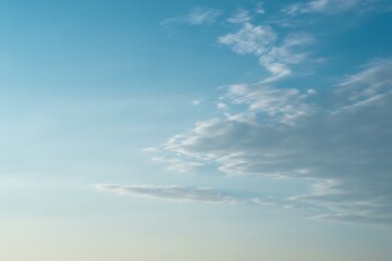 Ethereal sky with tranquil wisps of cloud formation during daylight hours