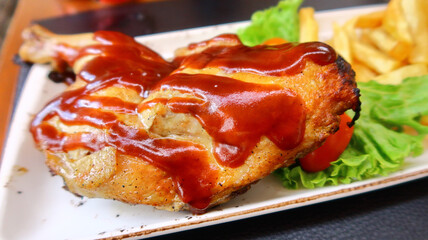 A tasty roast chicken covered in brown sauce