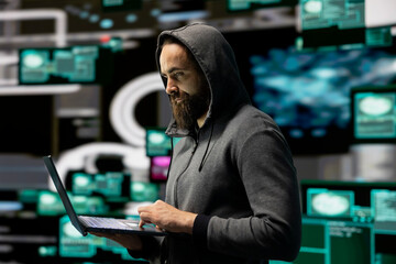 Skilled IT expert compromising cyber security through malware and viruses, digital threat of...