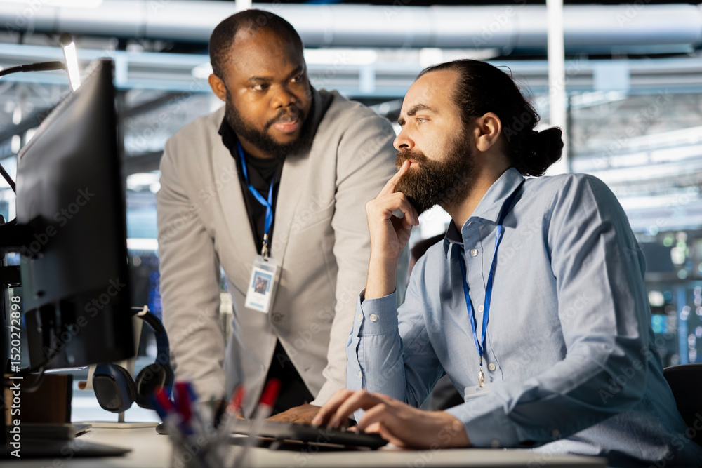 Poster data center manager supervising work done by employee verifying neural network parameters. server hu