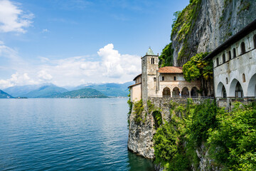 Santa Caterina del Sasso hermitage monastery is a popular landmark on Lago Maggiore Lake, Italy