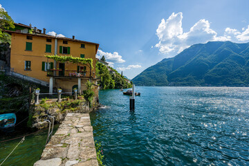 Nesso, Lake Como, Lombardy, Itlay: Part of the small village of Nesso that stands on the steep mountain slopes of Lake Como in northern Italy.