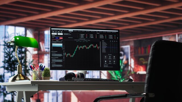 Modern trading setup with monitor running forex trends going up, high end classy apartment workstation. Clean desk provide a professional space for stock exchange analysis. Camera A.