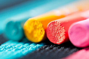Three Sturdy Cylindrical Wood Poles Seen From Low Angle Close Up Against Sky Background