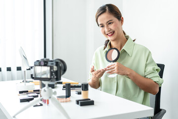 Woman blogger is present make up tutorial beauty cosmetic review product and broadcast live...