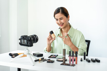 Woman blogger is present make up tutorial beauty cosmetic review product and broadcast live...