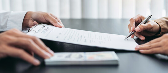 Bribe employer is offer terms to the businessman for signing on contract while making corruption about buy land and real estate