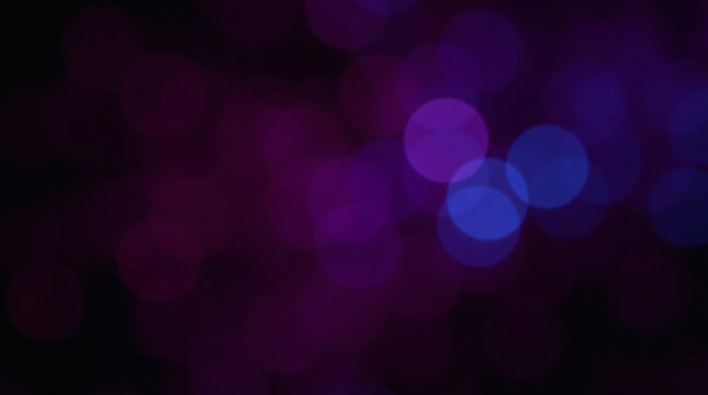 Abstract bokeh lights in purple and blue hues.