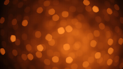 Obraz premium Warm bokeh lights with golden glow, creating a festive and cozy luminous background.
