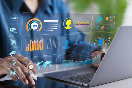 CRM for sales, Customer relationship management software concept. Businessman using laptop with sales control and monitoring software with client database.