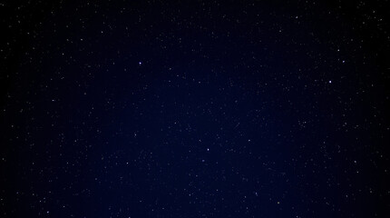Dark night sky with subtle stars, creating a serene and tranquil atmosphere.