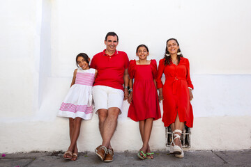 Young family of four traveling together. Family love concept. Travel concept. Cartagena de Indias.