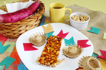 Festa Junina Table with Pé-de-Moleque, Peanuts, and Sweet Potato – Brazilian Celebration.