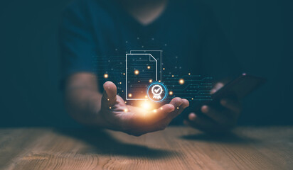 Document audit for business concept. Businessman holding file document with check mark hologram in hand. Approval and online evaluation with smartphone. Quality control. File certificate.