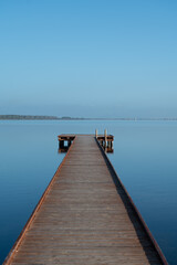 Morning stillness and mirror-quiet water at Stagnone of Marsala, lagoon and nature reserve near Marsala, Sicily, Italy, fisherman's boats