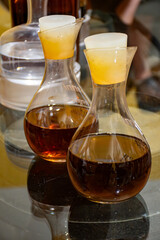 Visit of wine cellar with old large oak barrels, production of fortified dry or sweet tasty marsala wine in Marsala, Sicily, Italy