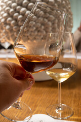Visit of wine cellar with old large oak barrels, tasting of fortified dry or sweet tasty marsala wine in Marsala, Sicily, Italy