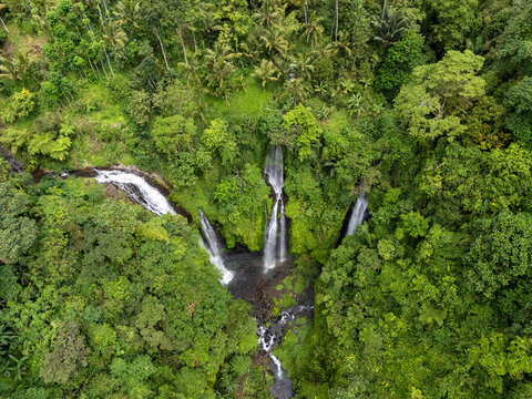 Fiji waterfall, located in Lemukih village, Singaraja, Bali, has three waterfalls seen from above aerial drone