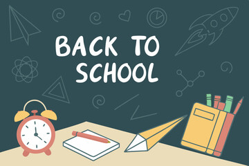 Back to school classroom scene with a chalkboard background filled with mathematical formulas, geometry diagrams, and white chalk scribbles. On a wooden desk in the foreground are school supplies