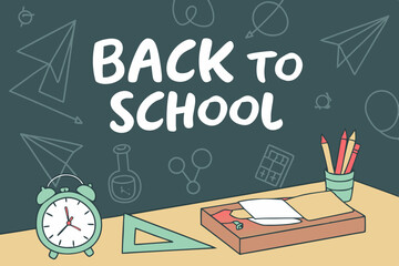 Back to school classroom scene with a chalkboard background filled with mathematical formulas, geometry diagrams, and white chalk scribbles. On a wooden desk in the foreground are school supplies
